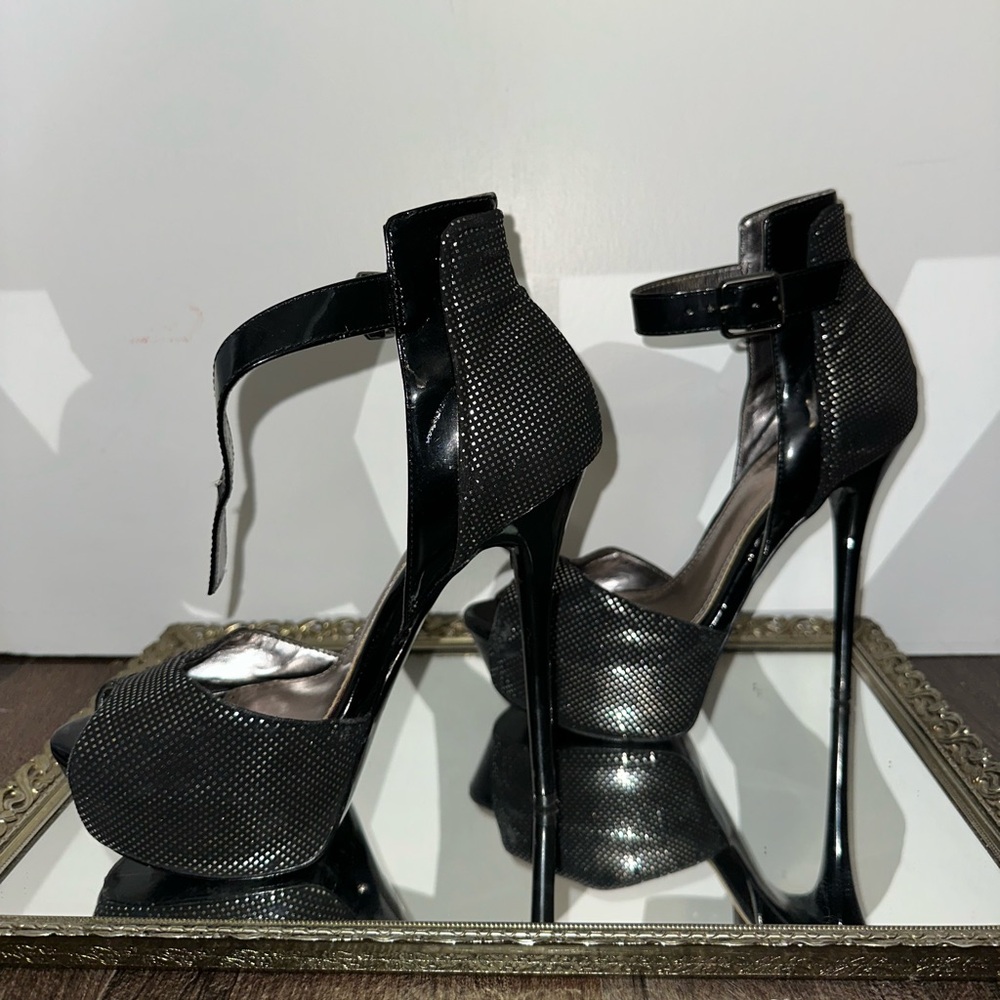 Bakers black high heels with silver details all over!